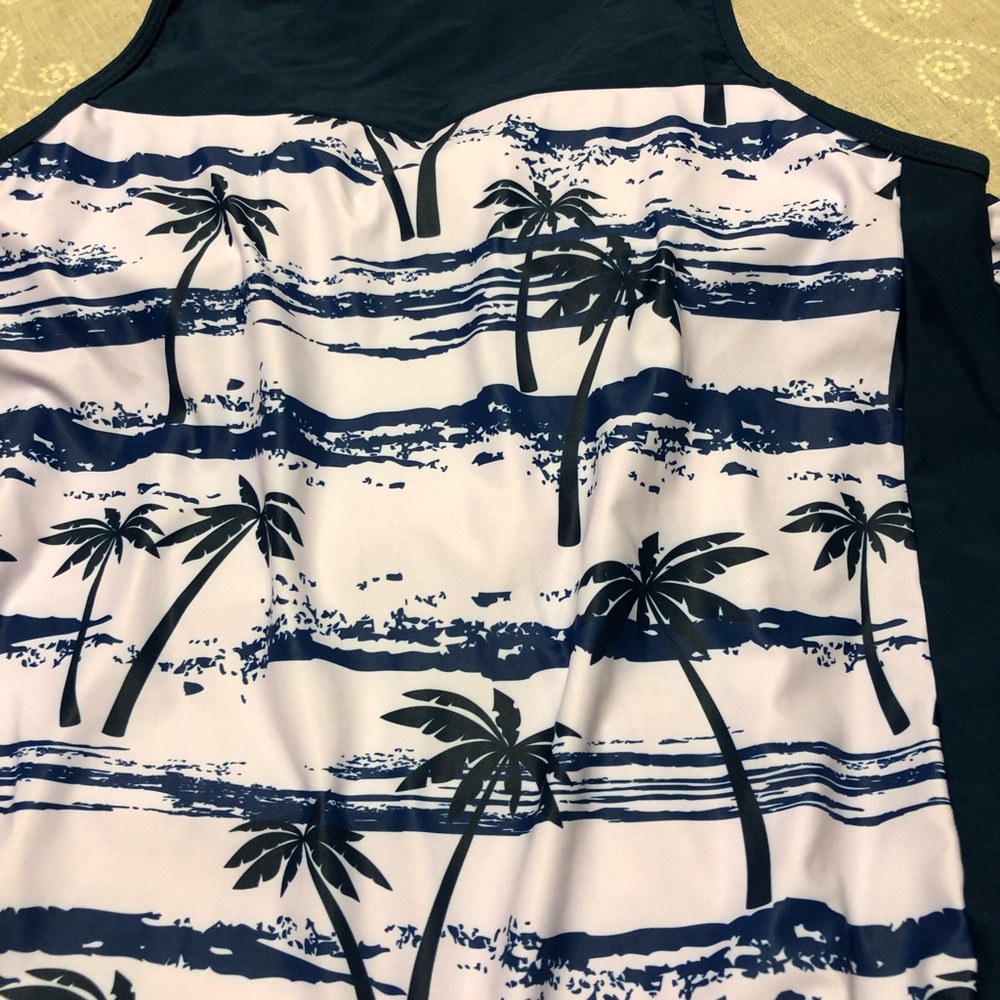 Bathing suit , never worn . It’s a 2 piece with a matching bottom. - Picture 2 of 8